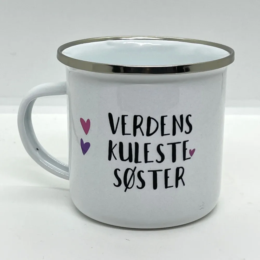 "VERDENS KULESTE SØSTER" - KRUS I EMALJE
