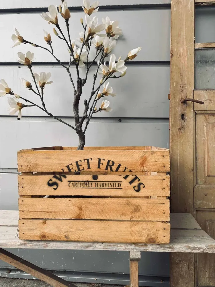 Blomsterkasse med skrift