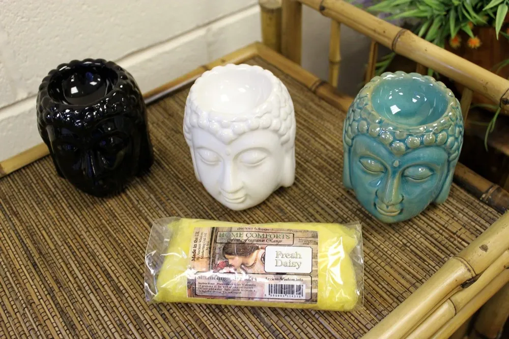 Buddha-hode telys oljebrenner, hvit keramikk
