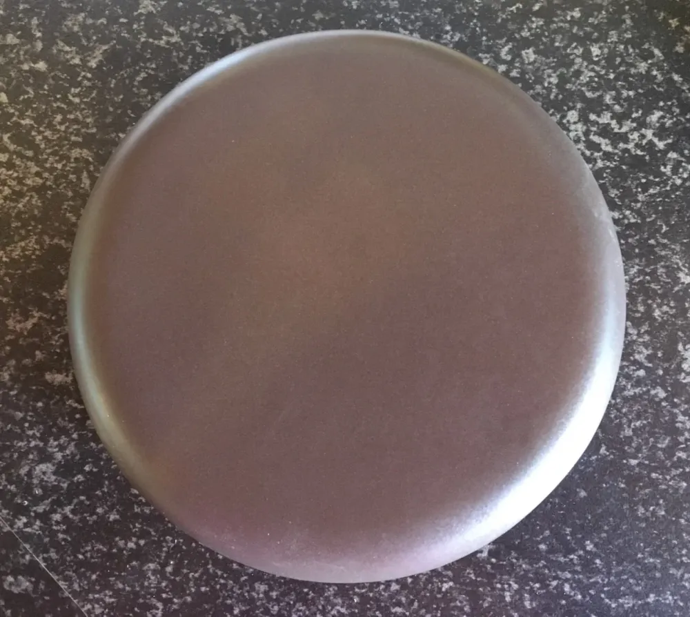 Rengjøring av fliser nougat brunt gipslokk flislagt komfyr rundt 15 cm