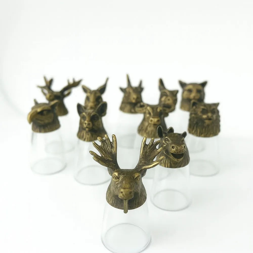 12 skogsdyr bunn-opp shotglass, antikk bronse